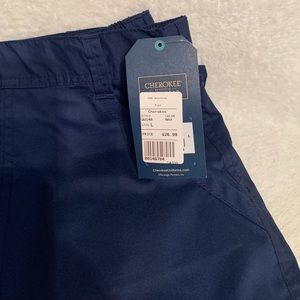 Men’s Cherokee scrub pants. Zipper and button with ties. Size large. Navy blue.